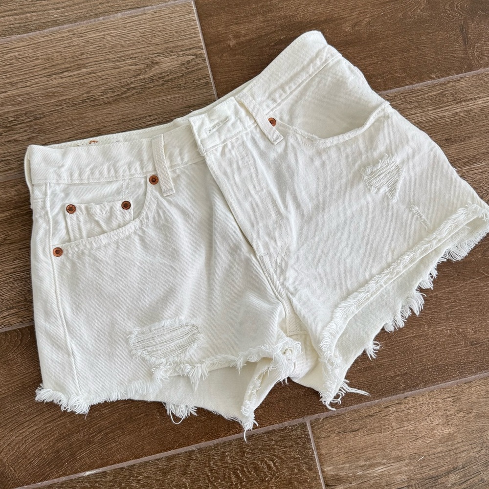 Levi’s 501 White Distressed Denim Shorts - 25